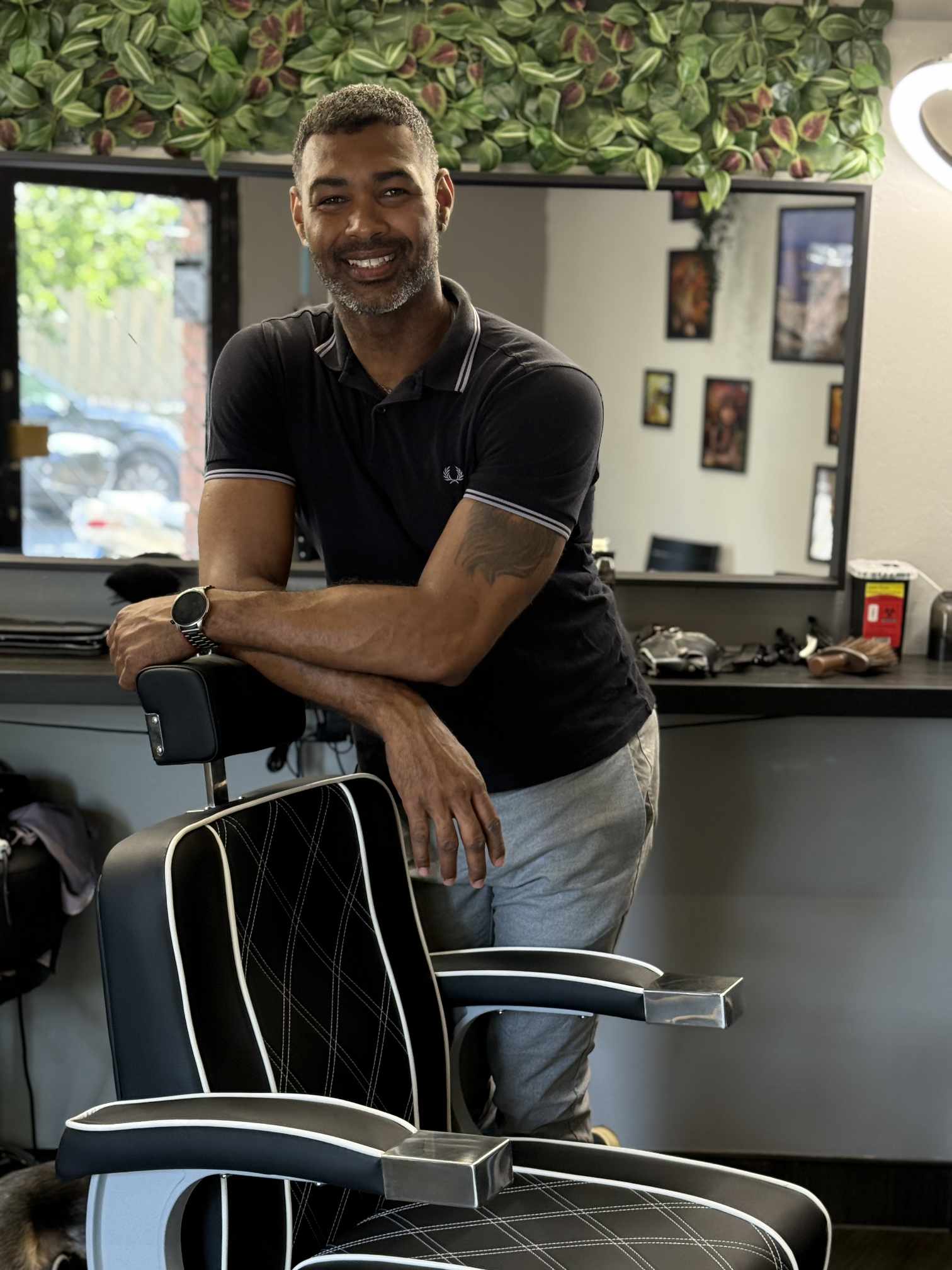 Arthur King the barber and the owner of Studio Rio Barber Shop